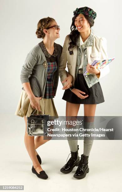 Page Parkes models, Erin Barr left, wears Peter Pan collared blouse with jeweled embellishment, Urban Outfitters $29 Grey cardigan, Mossimo Supply...