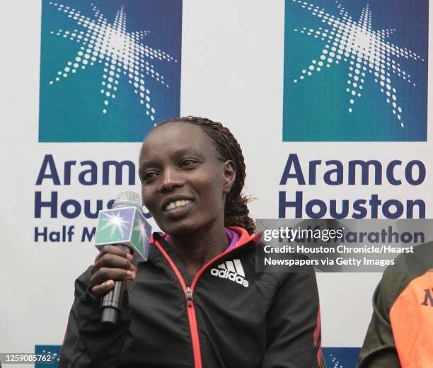 Elite female half marathon runner Caroline Kilel speaks during the 2013 Chevron Houston Marathon Pre-race Press Conference at the George R. Brown...