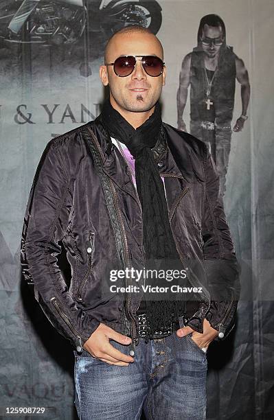 Singer Juan Luis Morera of Wisin Y Yandel attends a photocall to promote Wisin Y Yandel new album "Los Vaqueros El Regreso Deluxe Edition" at Hotel W...