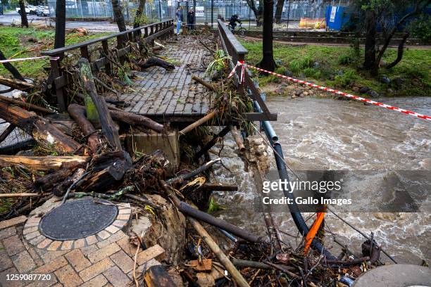 Damaged pedestrian bridge over the Eerste River on June 14, 2023 in Stellenbosch, South Africa. It is reported that heavy disruptive rain over large...