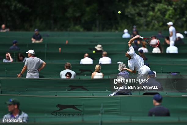 Players take part in the Wimbledon qualifying tennis tournament in Roehampton in west London on June 26, 2023. Pristine grass courts and trademark...