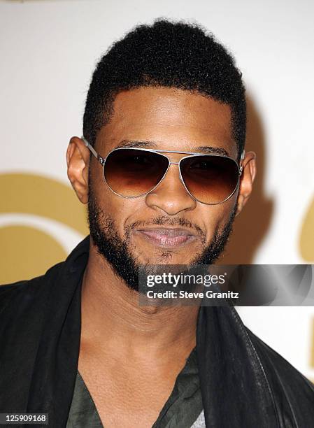 Singer Usher poses in the press room at The 53rd Annual GRAMMY Awards held at Staples Center on February 13, 2011 in Los Angeles, California.