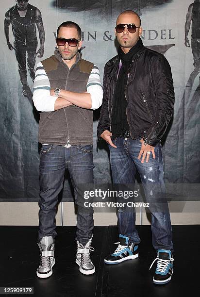 Llandel Veguilla and Juan Luis Morera of Wisin Y Yandel attend a photocall to promote their new album "Los Vaqueros El Regreso Deluxe Edition" at...