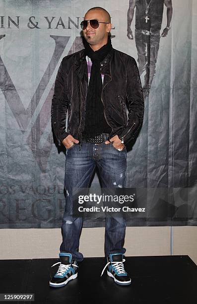 Singer Juan Luis Morera of Wisin Y Yandel attends a photocall to promote Wisin Y Yandel new album "Los Vaqueros El Regreso Deluxe Edition" at Hotel W...