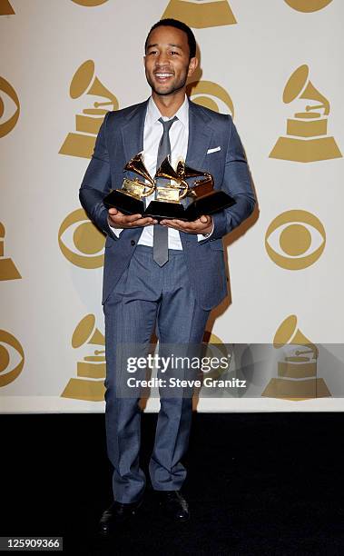 John Legend poses in the press room at The 53rd Annual GRAMMY Awards held at Staples Center on February 13, 2011 in Los Angeles, California.