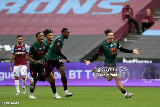 Jack Grealish of Aston Villa celebrates after scoring his team's first goal during the Premier League match between West Ham United and Aston Villa...