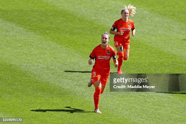 Sophie Schmidt of Houston Dash celebrates after scoring a penalty kick in the 5th minute against Alyssa Naeher of Chicago Red Stars during the first...