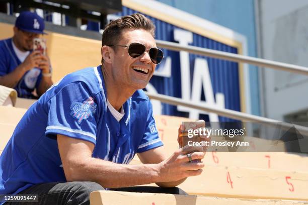 In this image released on June 26, Ryan Seacrest partners with Health-Ade to bring kombucha to LA Dodger Fans at Dodger Stadium on May 17, 2023 in...