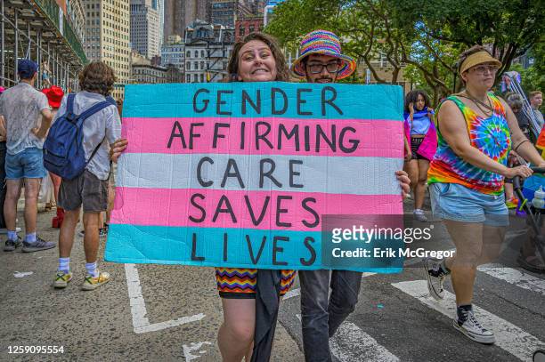 Participant seen holding a sign at the march. Thousands of New Yorkers took to the streets of Manhattan to participate on the Reclaim Pride...