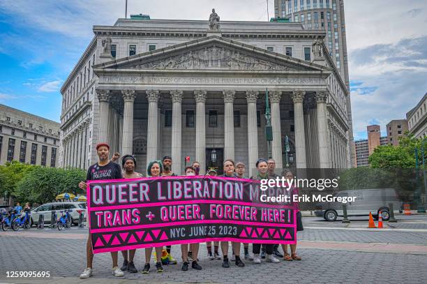 Participants seen holding a banner at the march. Thousands of New Yorkers took to the streets of Manhattan to participate on the Reclaim Pride...