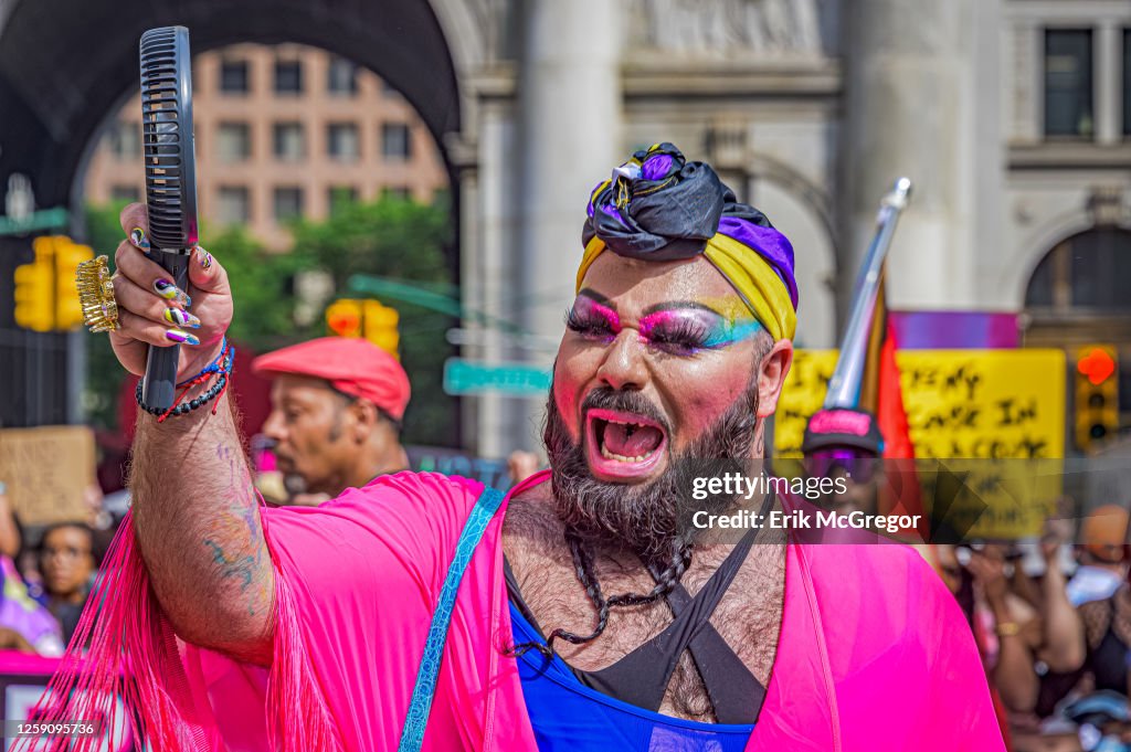 Participants seen at the march. Thousands of New Yorkers...