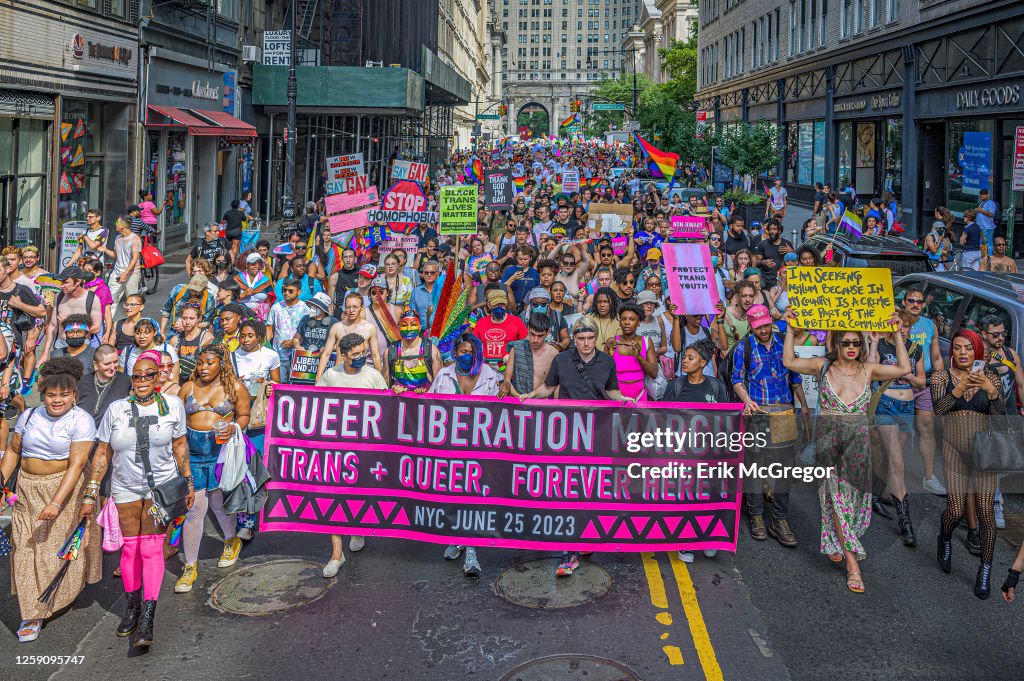 Thousands March In Participants seen holding a banner at the march. Thousands of New ...