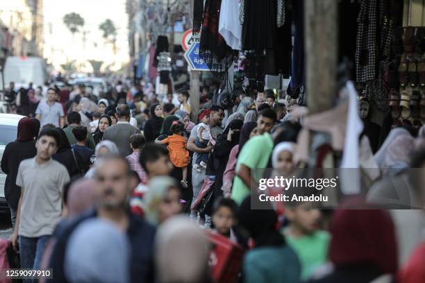 People shop ahead of the Eid al-Adha at Al Zawiya Bazaar in Gaza City, Gaza on June 26, 2023.