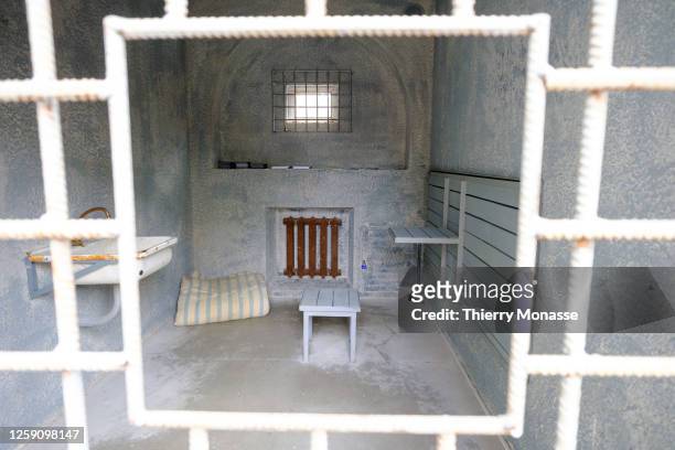 Supporters of 'Leader of Russia of the Future' Alexei Navalny show a reconstitution of his penitentiary cell in Place du Luxembourg, in front of the...