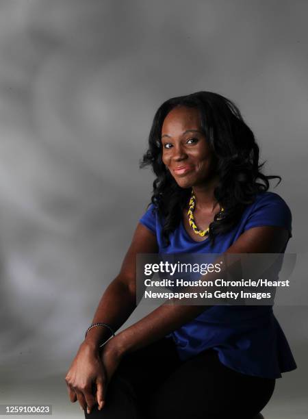 Bone marrow transplant patient Maria Adeoti poses for a portrait Tuesday, Sept. 24 in Houston.