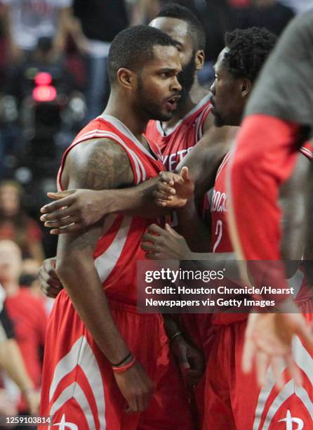 Houston Rockets guard Troy Daniels celebrates with teammates after hitting the game-winning shot during the second half of game three of the Western...