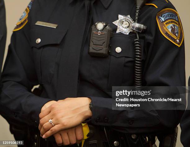 Harris County Sheriff Deputy wears a camera during a press conference announcing Harris County District Attorney Devon Anderson's plan to purchase...