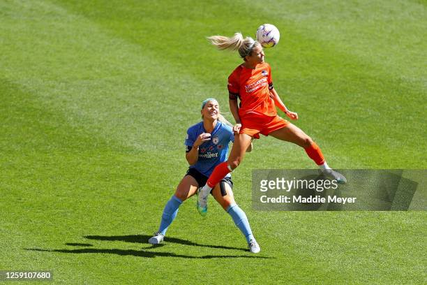 Rachel Daly of Houston Dash heads the ball over Julie Ertz of Chicago Red Stars during the first half in the championship game of the NWSL Challenge...