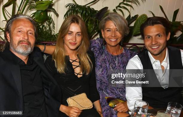 Mads Mikkelsen, Laura Karberg Simonsen, Hanne Jacobsen and Carl Jacobsen Mikkelsen attend the Post-Premiere Drinks Reception for "Indiana Jones And...