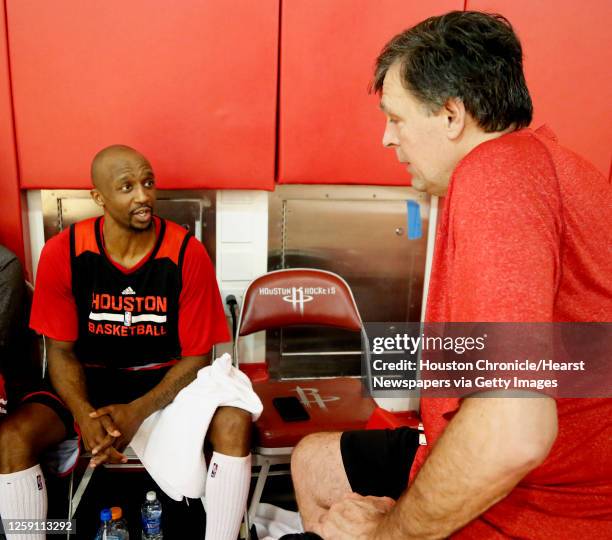 Houston Rockets guard Jason Terry left, and Rockets head coach Kevin McHale right, chat during the Rockets practice at the Toyota Center on Sunday,...