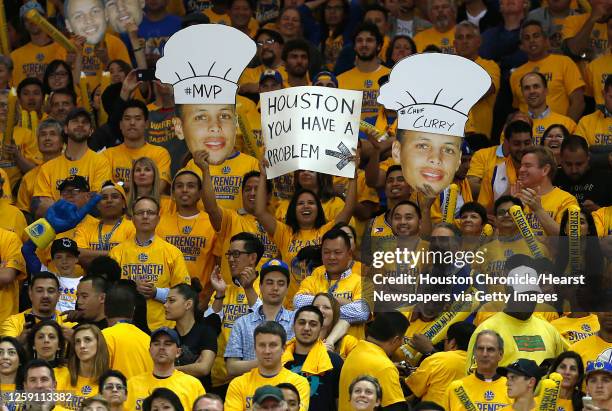 Golden State Warriors fans taunt the Houston Rockets during the fourth quarter of Game 1 of the NBA Western Conference Finals at Oracle Arena on...