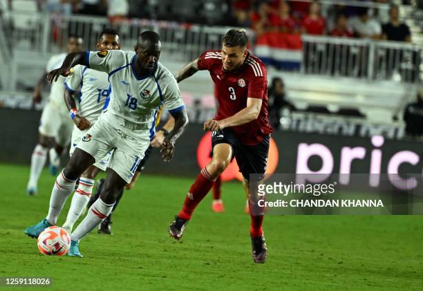 Panama's forward Cecilio Waterman vies with Costa Rica's defender Juan Pablo Vargas during the Concacaf 2023 Gold Cup Group C football match between...