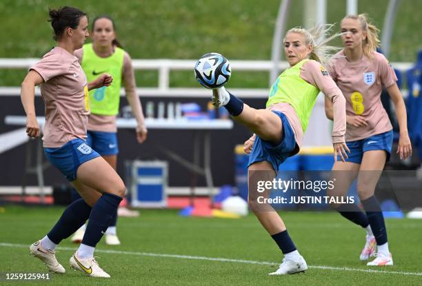 England's defender Alex Greenwood attends a team training session at St George's Park in Burton-on-Trent, central England, on June 27, 2023 ahead of...