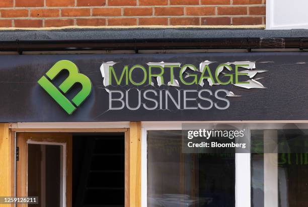 Sign above the entrance to a mortgage advice business in Brentwood, UK, on Tuesday, June 27, 2023. Rising mortgage payments are squeezing the...