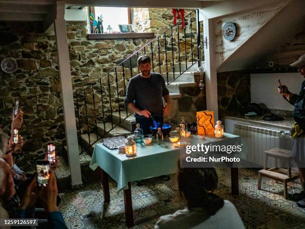 Man in an Albergue is preparing the ''Queimada'', a sort of alcoholic beverage of Celtic origin that we drink in a sort of ritual, which is also...