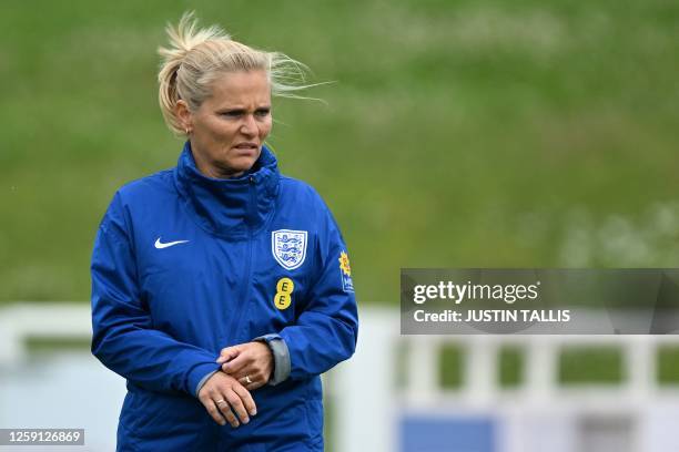 England's Dutch head coach Sarina Wiegman takes a team training session at St George's Park in Burton-on-Trent, central England, on June 27, 2023...