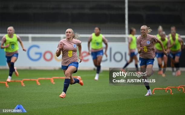 England's midfielder Georgia Stanway attends a team training session at St George's Park in Burton-on-Trent, central England, on June 27, 2023 ahead...