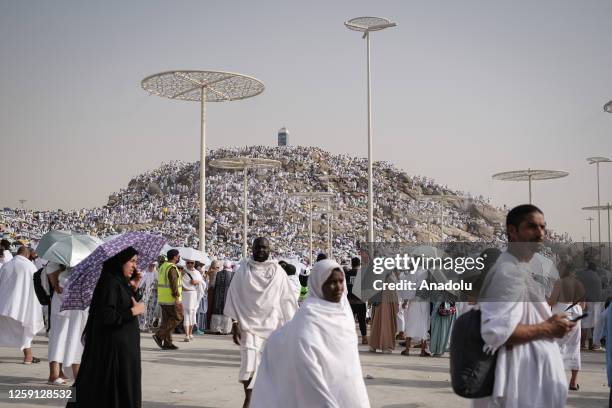 Prospective pilgrims pray at the Jabal ar-Rahmah in Arafat as Muslims continue their worship to fulfill the Hajj pilgrimage in Mecca, Saudi Arabia on...