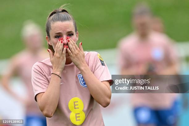 England's striker Ella Toone reacts during a team training session at St George's Park in Burton-on-Trent, central England, on June 27, 2023 ahead of...