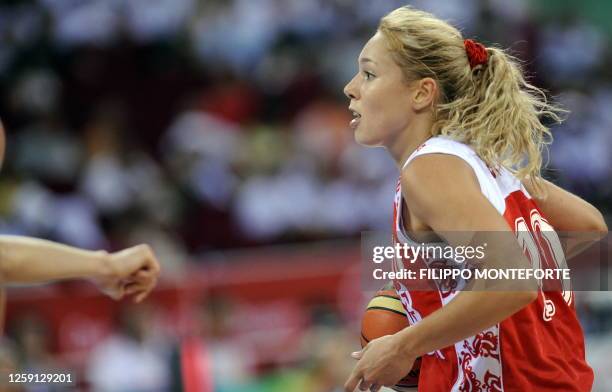 Russia's Ilona Korstin vies with Belarus' Anastasiya Verameyenke during a 2008 Beijing Olympics women's preliminary round group A basketball match at...