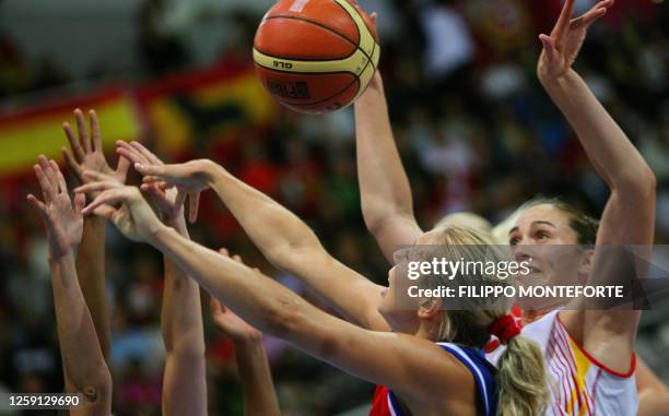 Spain's Irene Herradas and Russian Ilona Korstin jump for the ball during the final of the Women European Basketball Championships in Chieti Arena,...