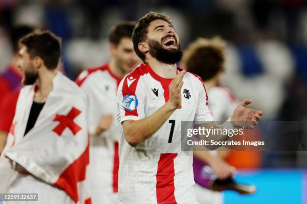 Zuriko Davitashvili of Georgia celebrating reaching the quarterfinals during the EURO U21 match between Holland U21 v Georgia U21 at the Dynamo Arena...