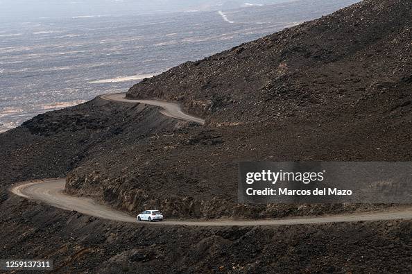 A car heading though a dirt road to Cofete Beach, south of...