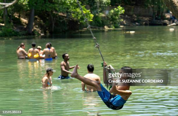 Residents swim at Barton Creek Pool on June 27, 2023 in Austin, Texas. A dangerous and prolonged heat wave blanketed large parts of the southern US...