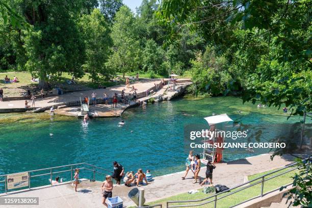 Residents swim at Barton Creek Pool on June 27, 2023 in Austin, Texas. A dangerous and prolonged heat wave blanketed large parts of the southern US...