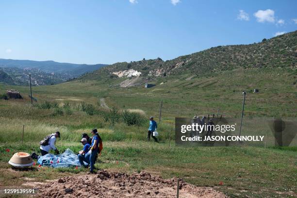 Scientists and engineers from NASA, the University of Arizona, and Lockheed Martin conduct NASA's first major asteroid sample recovery rehearsal for...