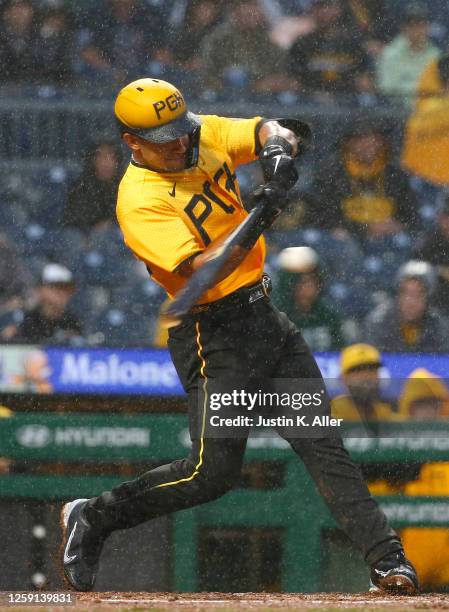 Nick Gonzales of the Pittsburgh Pirates hits an RBI triple in the second inning against the San Diego Padres at PNC Park on June 27, 2023 in...