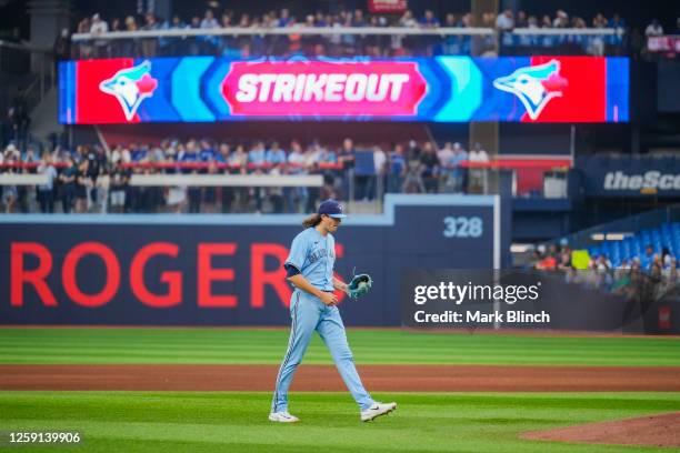 Kevin Gausman of the Toronto Blue Jays celebrates his 1500th career strikeout during the fourth inning against the San Francisco Giants at the Rogers...