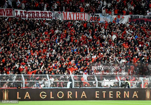 Fans of River Plate cheer for their team prior a Copa CONMEBOL Libertadores 2023 group D match between River Plate and The Strongest at Estadio Más...