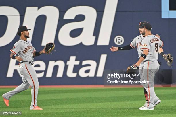 San Francisco Giants Outfield Blake Sabol and Outfield Luis Matos and Outfield Michael Conforto celebrate the win after during the regular season MLB...