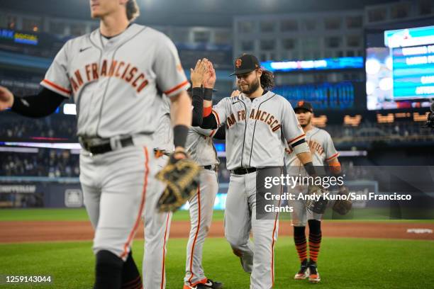 San Francisco Giants celebrate after a win against the Toronto Blue Jays at Rogers Centre on June 27, 2023 in Toronto, Ontario.