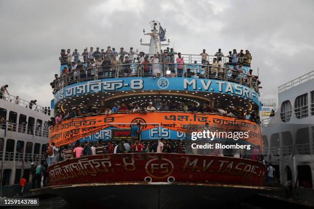 Passengers onboard a ferry at the Sadarghat ferry terminal ahead of Eid al-Adha in Dhaka, Bangladesh, on Tuesday, June 27, 2023. Greater exchange...