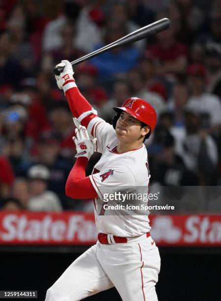 Los Angeles Angels pitcher Shohei Ohtani hits a solo home run during the seventh inning of an MLB baseball game against the Chicago White Sox played...