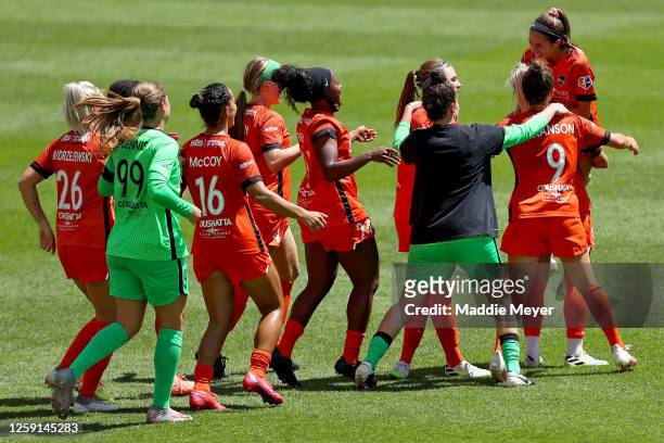 Shea Groom of Houston Dash celebrates with her teammates after defeating the Chicago Red Stars to win the championship game of the NWSL Challenge Cup...