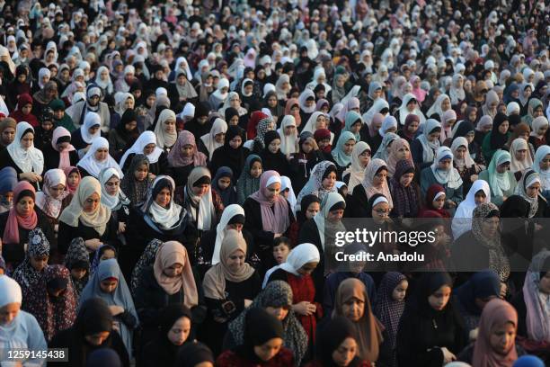 Palestinian Muslims perform Eid al-Adha prayer at an open area in Gaza City, Gaza on June 28, 2023.