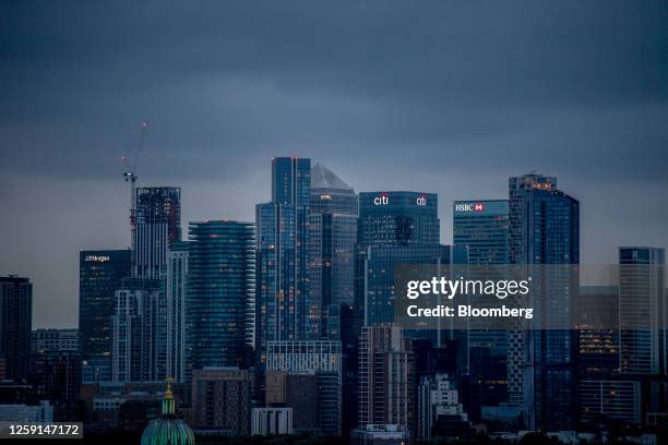 The HSBC Holdings Plc offices among other skyscrapers in the Canary Wharf business, financial and shopping district in London, UK, on Tuesday, June...